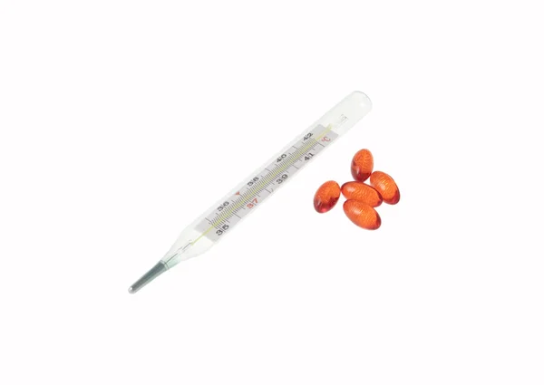 Thermometer and drugs isolated — Stock Photo, Image