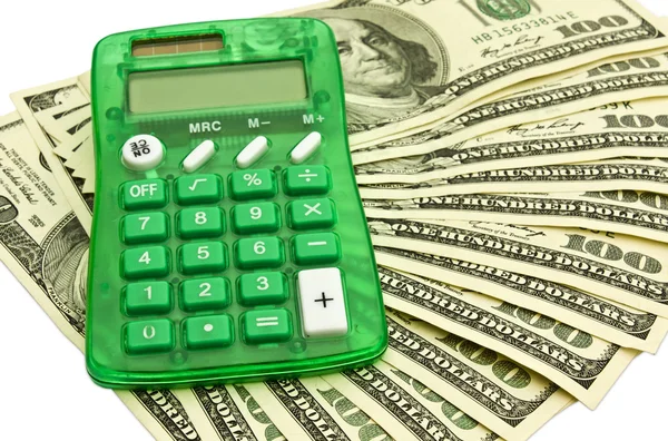 Деньги с калькулятором — стоковое фото