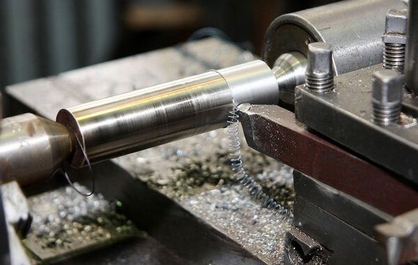 Metal processing on a lathe.