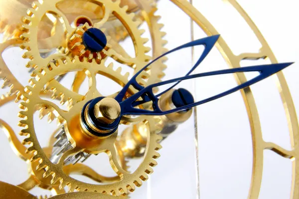 Mechanism of a gold clock Stock Photo