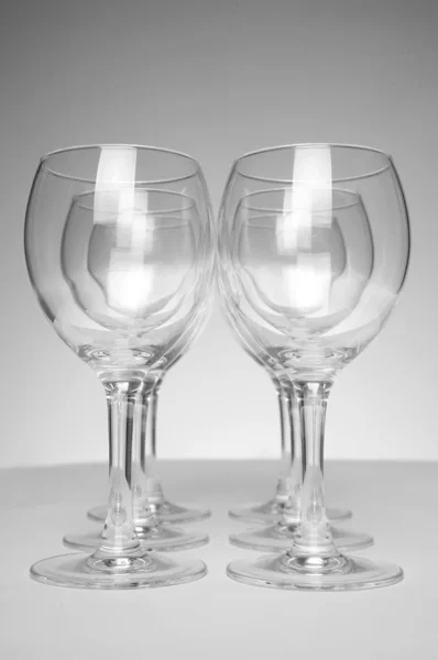 Empty glasses over white backgro — Stock Photo, Image