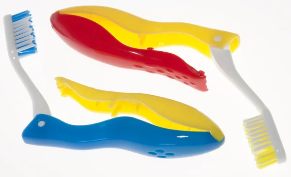Coppia di spazzolini da denti dai colori vivaci — Foto Stock