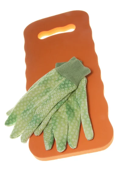 Zahradnické rukavice na klečící pad — Stock fotografie