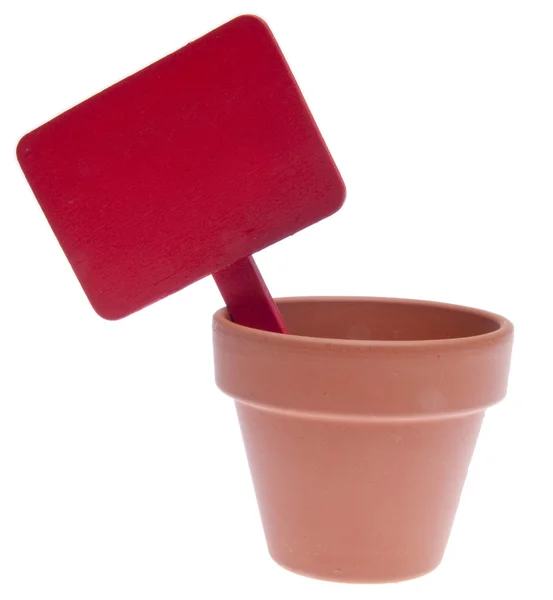 Pote de barro com sinal vermelho em branco — Fotografia de Stock