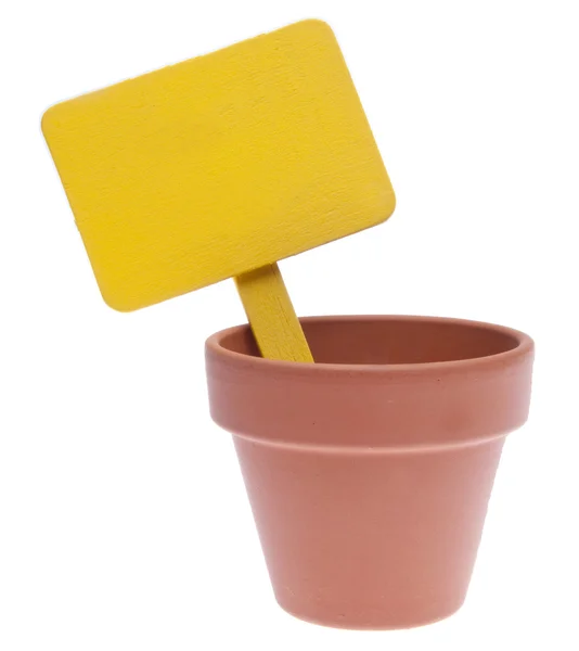 Clay Pot with Blank Yellow Sign — Stock Photo, Image