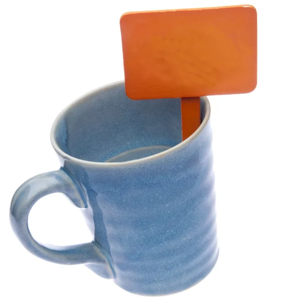 Giardino arancione segno in tazza blu — Foto Stock