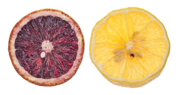 Segmenten van citroen en bloed oranje — Stockfoto