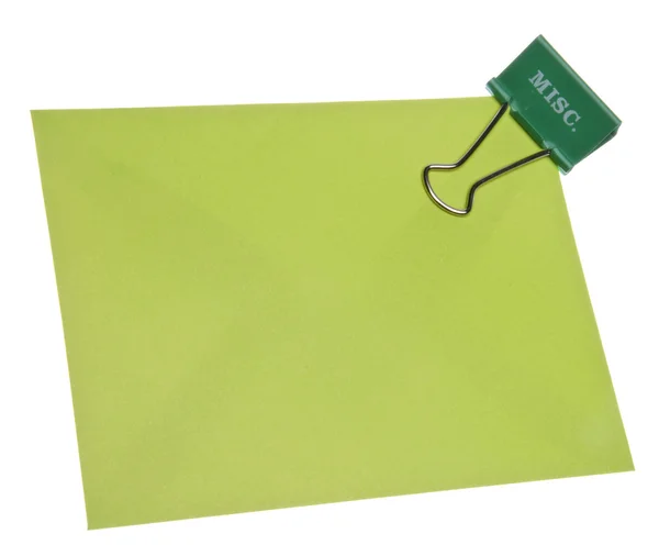 Clipe de papel MISC sobre papel verde . — Fotografia de Stock