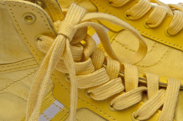 Tkaničky žluté boty — Stock fotografie