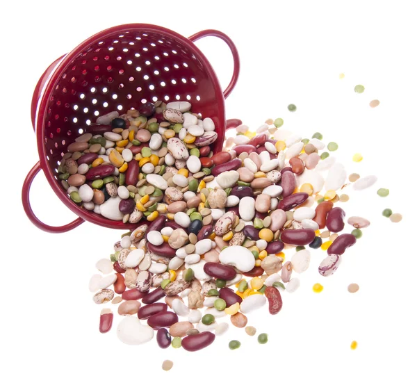 Zářivě barevné fazole v cedník — Stock fotografie