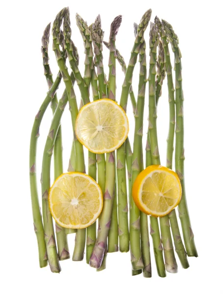 Asparagus and Sliced Lemons — Stock Photo, Image