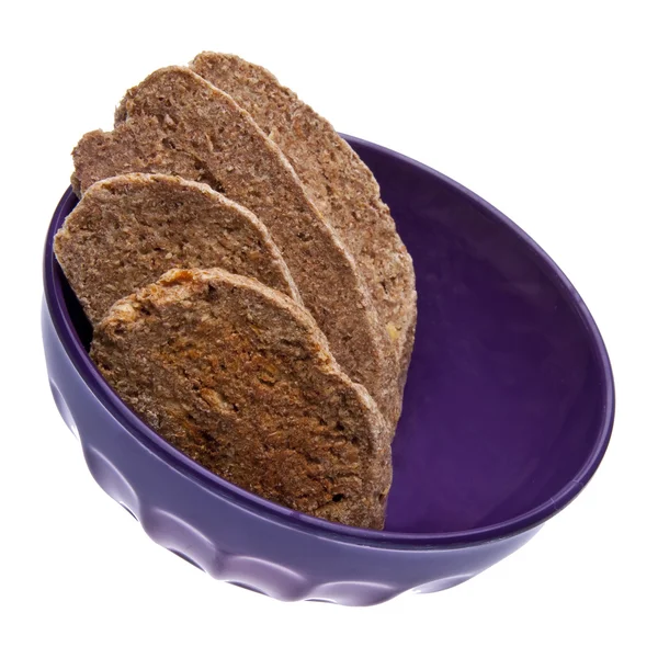 在一个紫色的碗中的饼干 — 图库照片