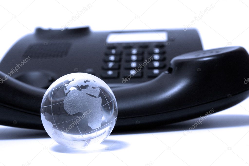 Business phone and glass globe
