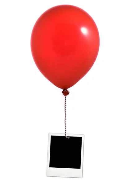 Červený balónek a foto rámeček — Stock fotografie