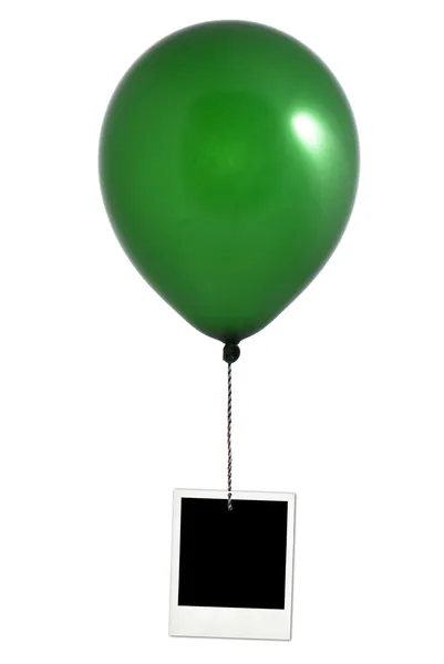 Green balloon and photo frame — Stock Photo, Image