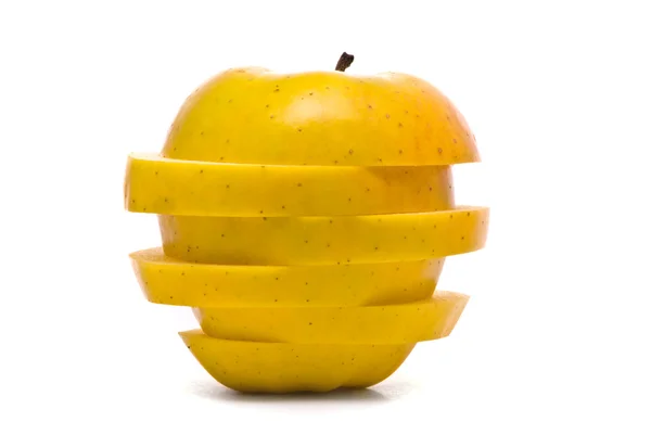 Sliced yellow apple on studio white — Stock Photo, Image