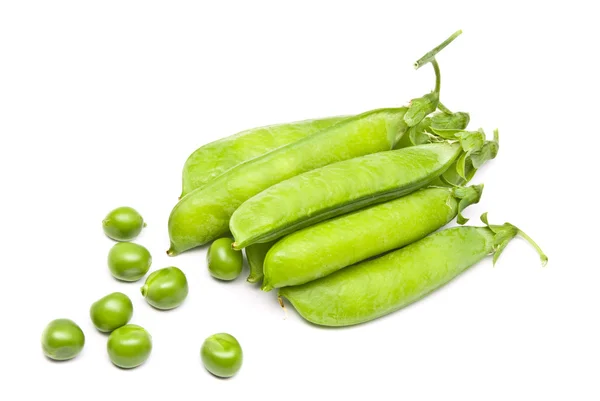 Капсулы свежего зеленого гороха — стоковое фото