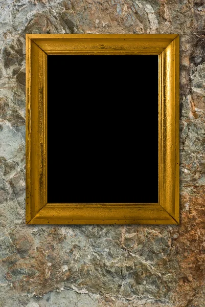 Stenen achtergrond met vintage gouden frame — Stockfoto