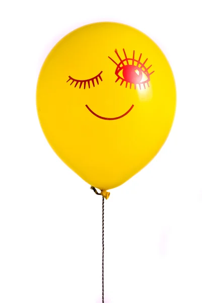 Sarı balon bir gülümseme ile — Stok fotoğraf