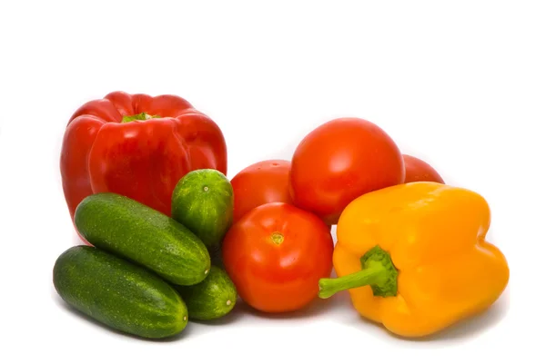 Frische Tomaten, Gurken und Paprika lizenzfreie Stockbilder