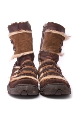 Woman winter boots isolated on white clipart