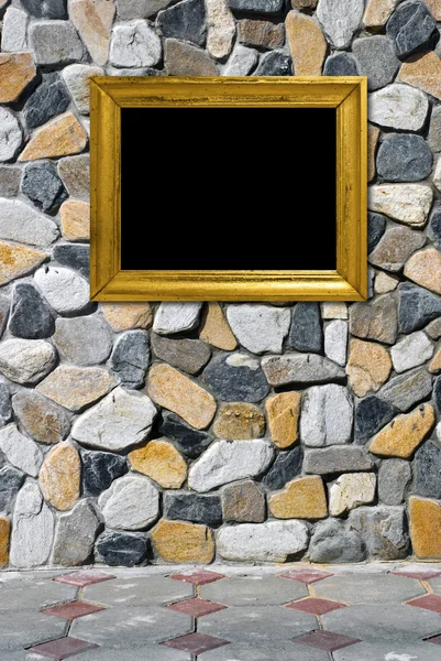 दगड पार्श्वभूमीवर गोल्डन फ्रेम — स्टॉक फोटो, इमेज