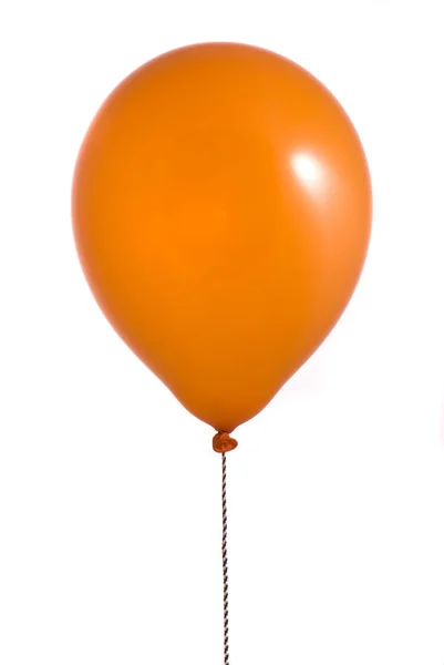 Oranžový balon na bílém pozadí — Stock fotografie