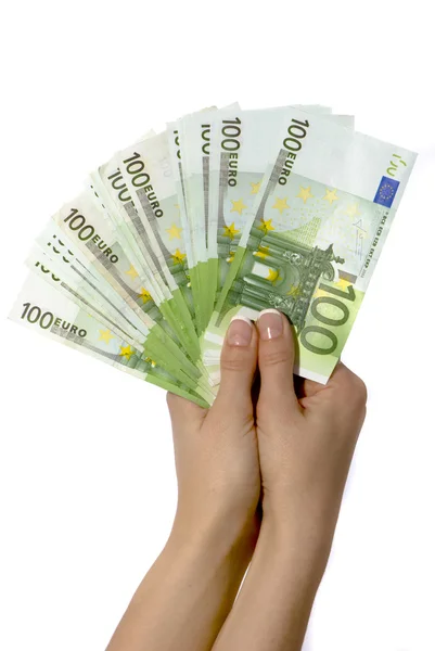 Notas de euro na mão das mulheres — Fotografia de Stock