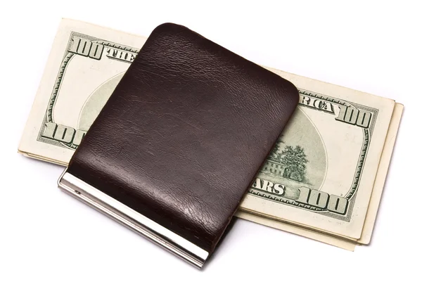Dinero en el bolso en el fondo blanco — Foto de Stock
