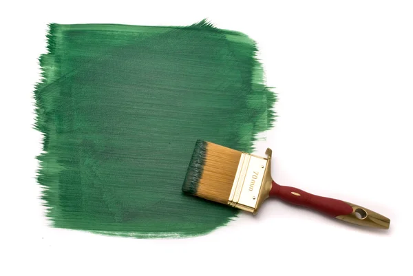 Brush with green paint — Stock Photo, Image