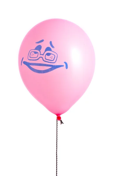 Beyaz üzerine pembe balon-bir gülümseme ile — Stok fotoğraf