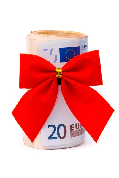 Rollo de dinero del euro y lazo rojo — Foto de Stock