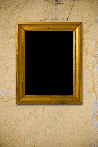 Grunge interior with vintage gold frame — Stock Photo, Image