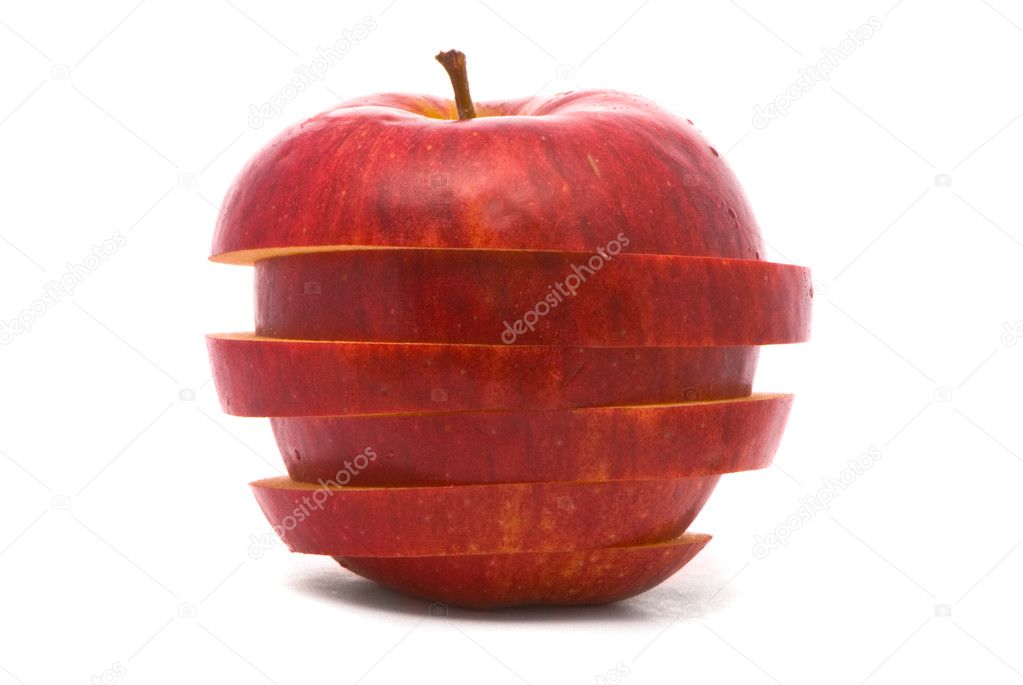 Sliced red apple on studio white