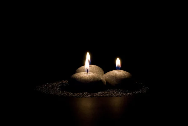Tre candele sotto forma di pietre — Foto Stock
