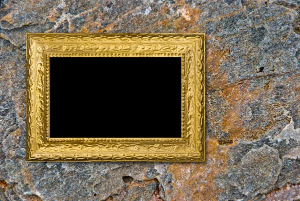 Sten bakgrund med vintage guld ram — Stockfoto