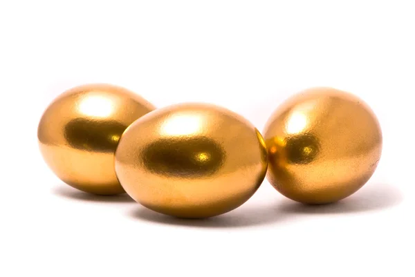 Trzy złote jaja — Zdjęcie stockowe