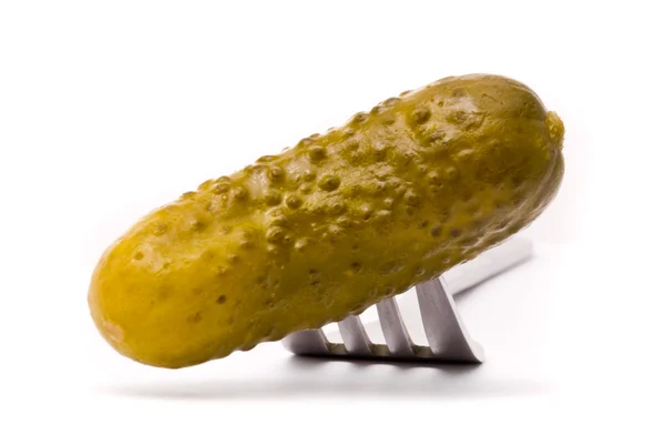 Pickled cucumber on a plug — Stock Photo, Image