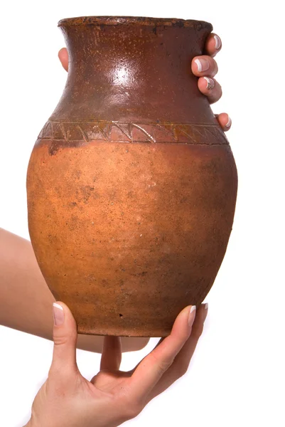 Old jug in woman hand — Stok fotoğraf