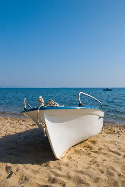 Plastic boat on beach — Stock Photo, Image