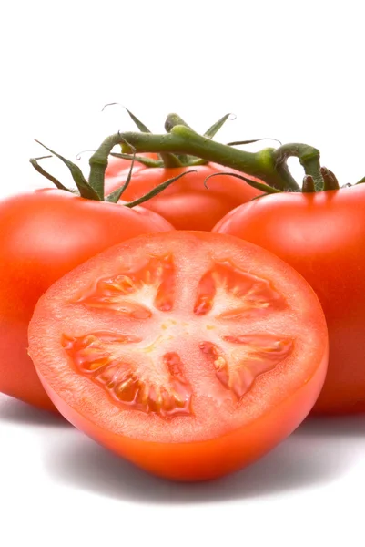 Fresh tomatoes on white. — Stock Photo, Image