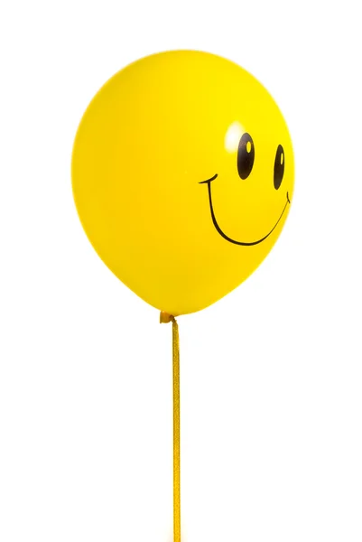Yellow balloon with smile — Stock Photo, Image