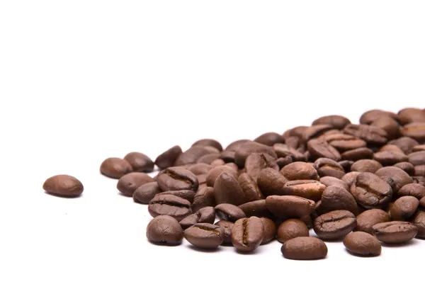 Kaffeebohnen auf weißem Hintergrund Stockbild