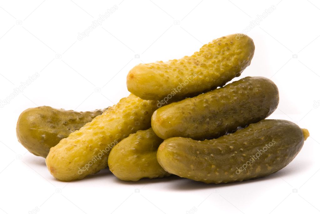 Salted cucumbers on a white background