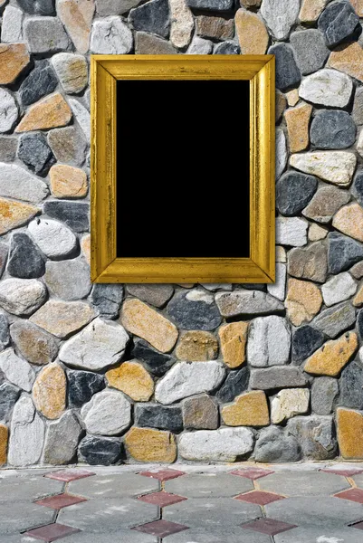 Marco dorado sobre fondo de piedra —  Fotos de Stock