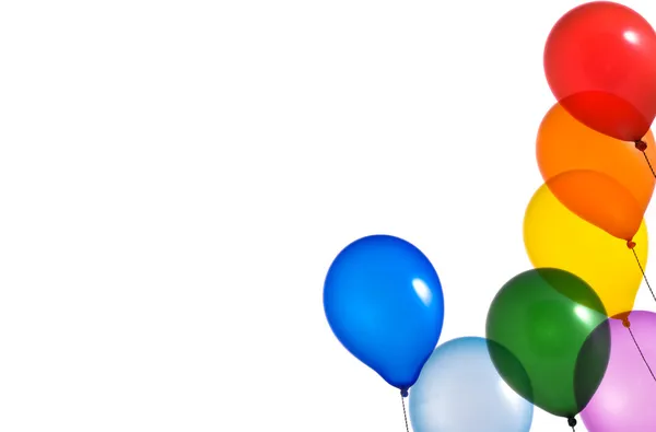 Balões de arco-íris no fundo branco — Fotografia de Stock