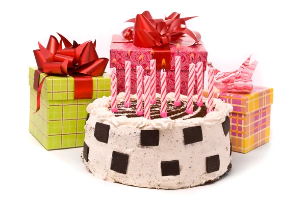 Torta con dieci candele e regali — Foto Stock