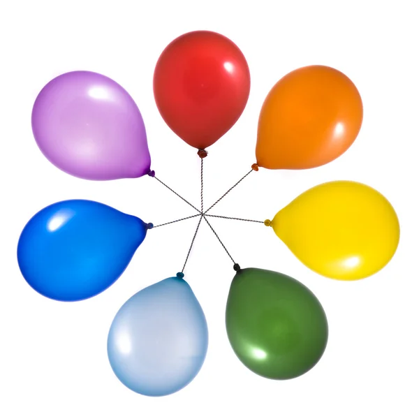 Regenbogen-Luftballons auf weißem Hintergrund — Stockfoto