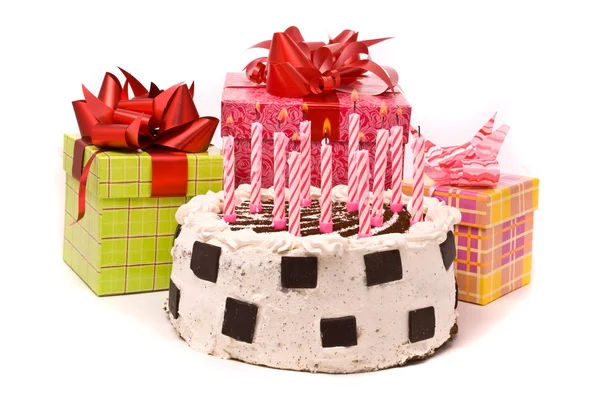 Torta con undici candele e regali — Foto Stock