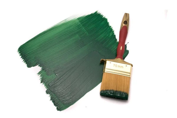 Cepillo con pintura verde — Foto de Stock
